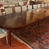 Extendable Louis XVI style mahogany dining table from the Directoire period