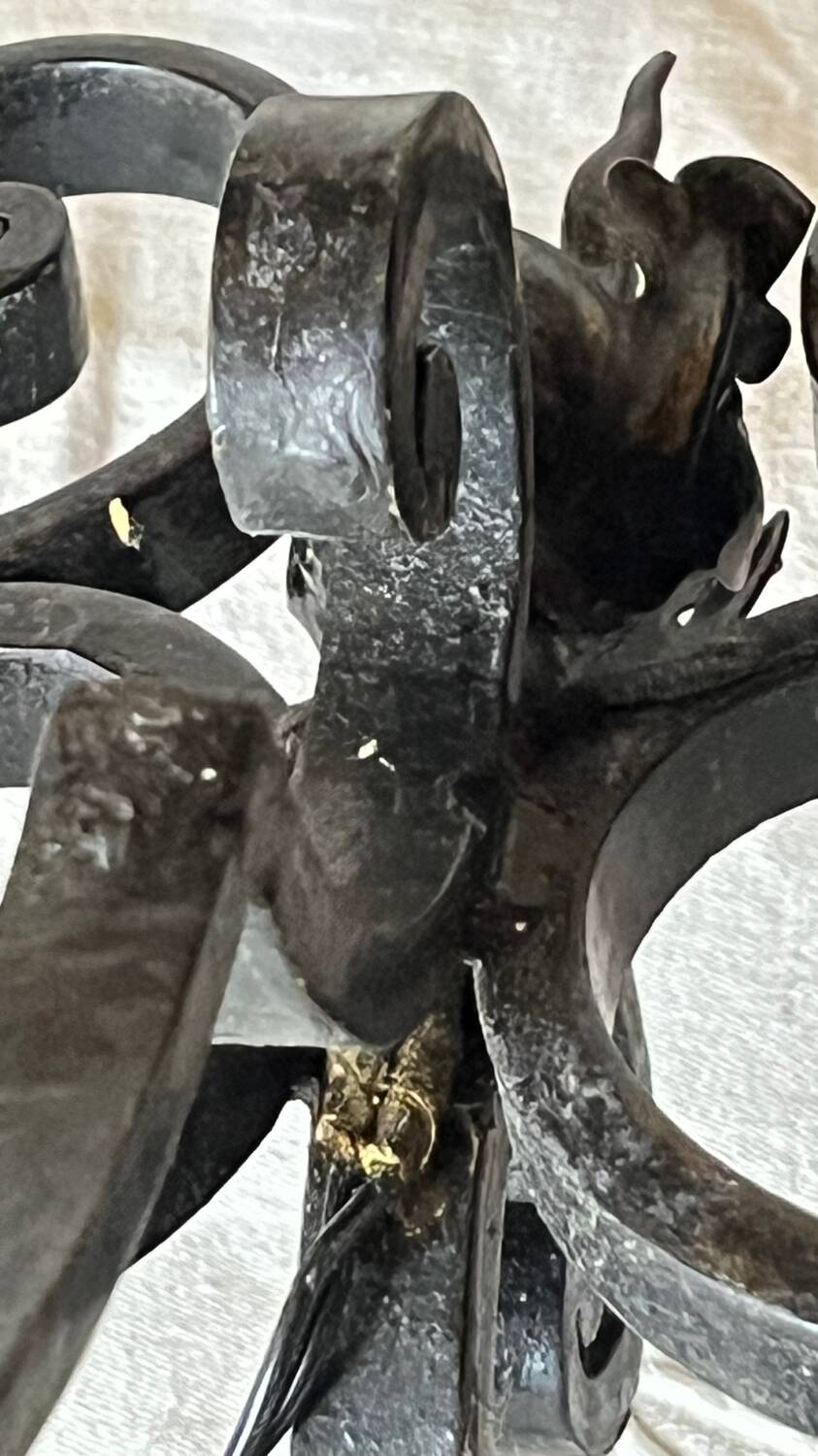 Pair of 3-light wrought iron candlesticks on vintage legs