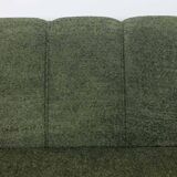 Sofa in bouclette fabric. Contemporary work.