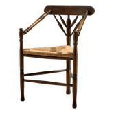 Oak armchair with three legs