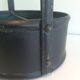 Leather wall magazine rack. In the style of Jacques Adnet.