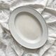 Vintage marbled white and blue enameled sheet metal oval dish