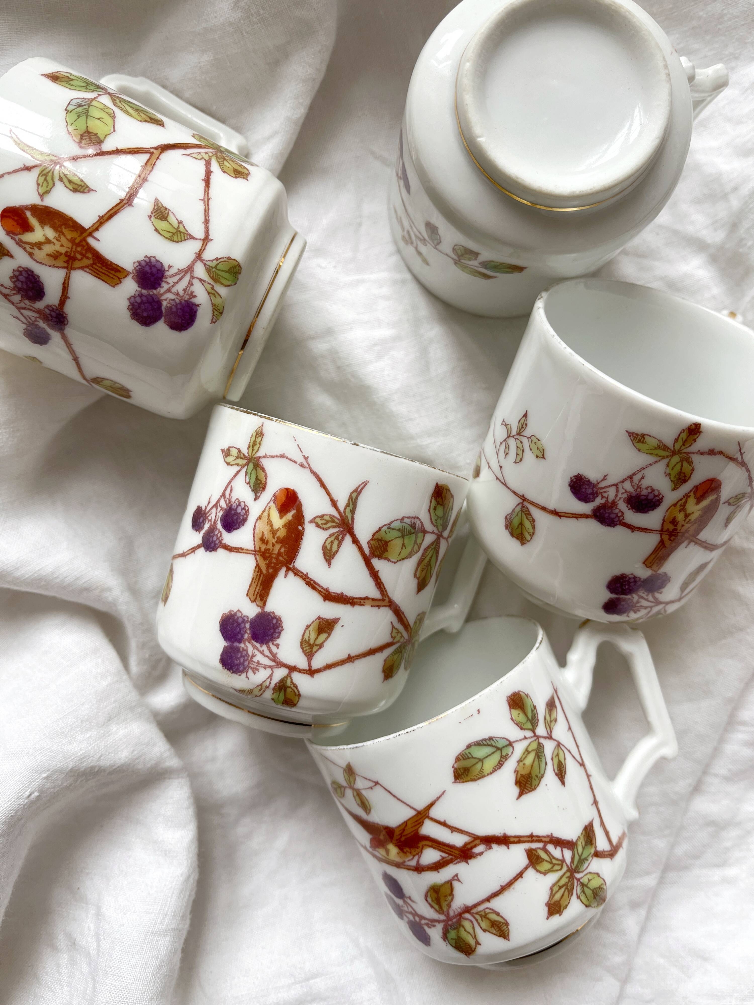 5 antique porcelain coffee cups decorated with birds