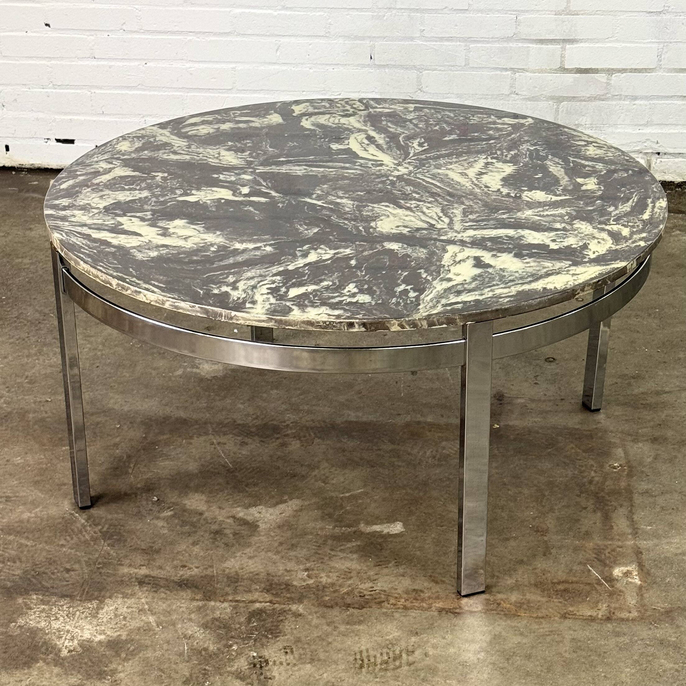 Round vintage coffee table with marble top and chrome base