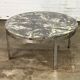 Round vintage coffee table with marble top and chrome base