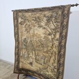 Tapestry with an idyllic forest scene