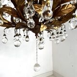 Chandelier with tassels and golden brass