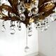 Chandelier with tassels and golden brass