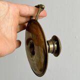 Brass candle holder with handle.