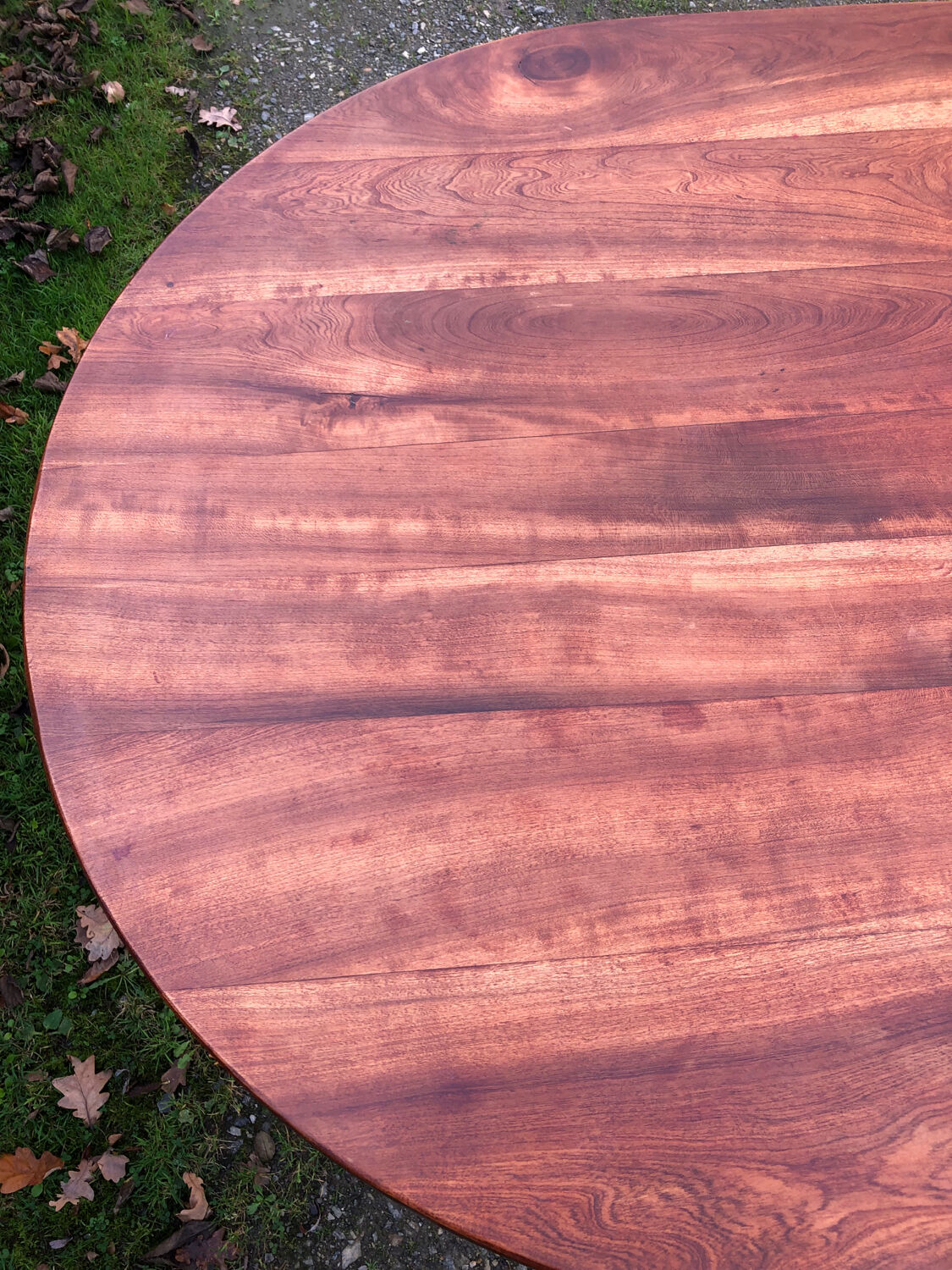 Antique cherry wood farmhouse table with rounded ends