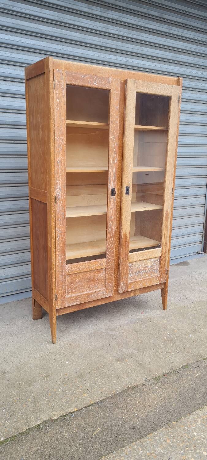 Armoire pied compas en chêne blond