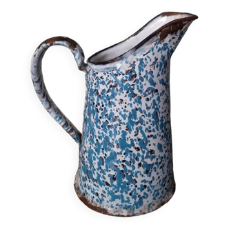 Small pitcher in mottled blue and black enameled sheet metal