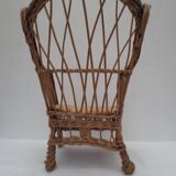 child's or doll's armchair in light woven wicker