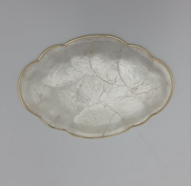 Empty pocket mother-of-pearl cup and gold metal strapping