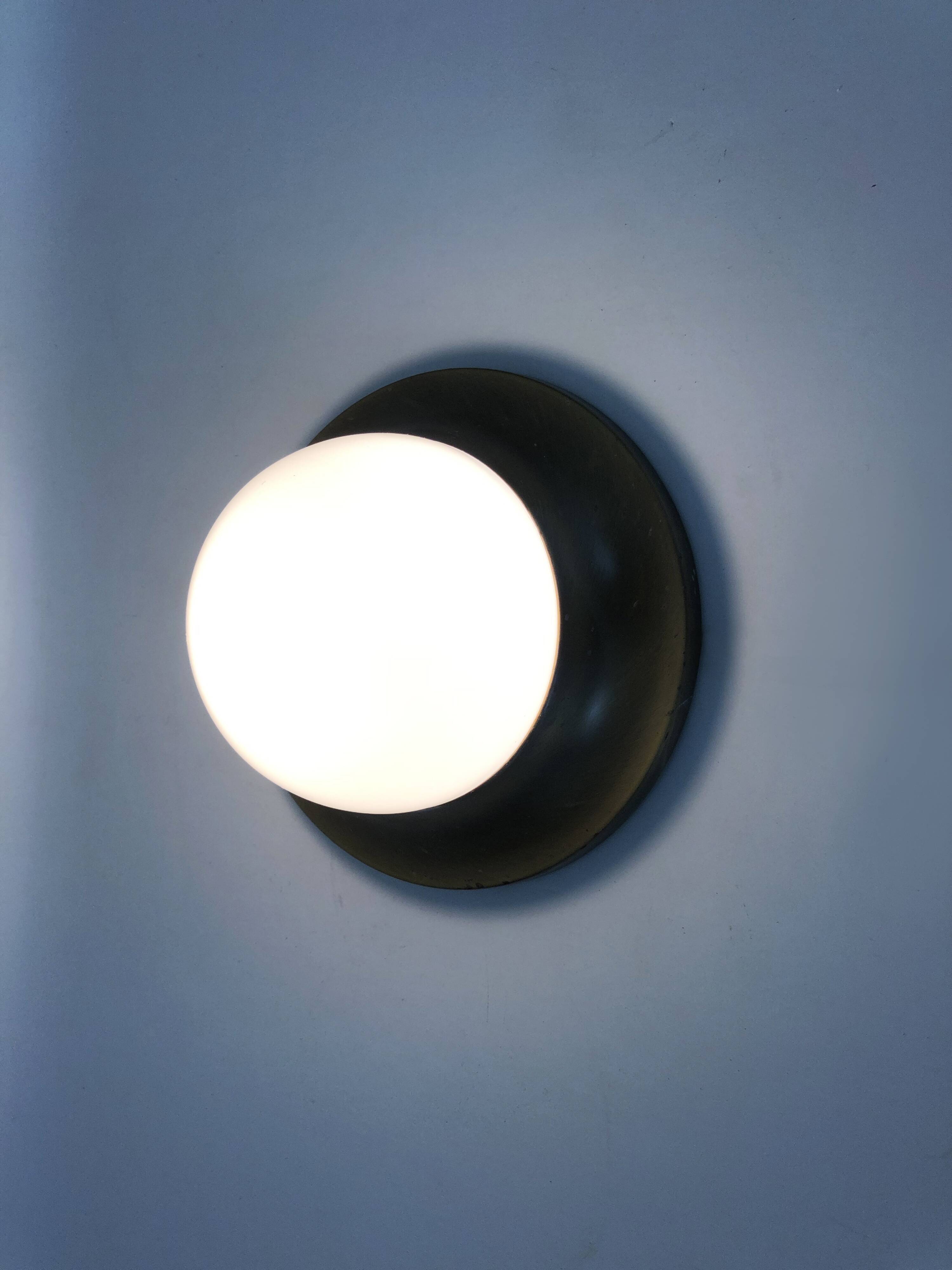 Pair of Space age wall lights made in Austria, Opaline gold metal. UFO