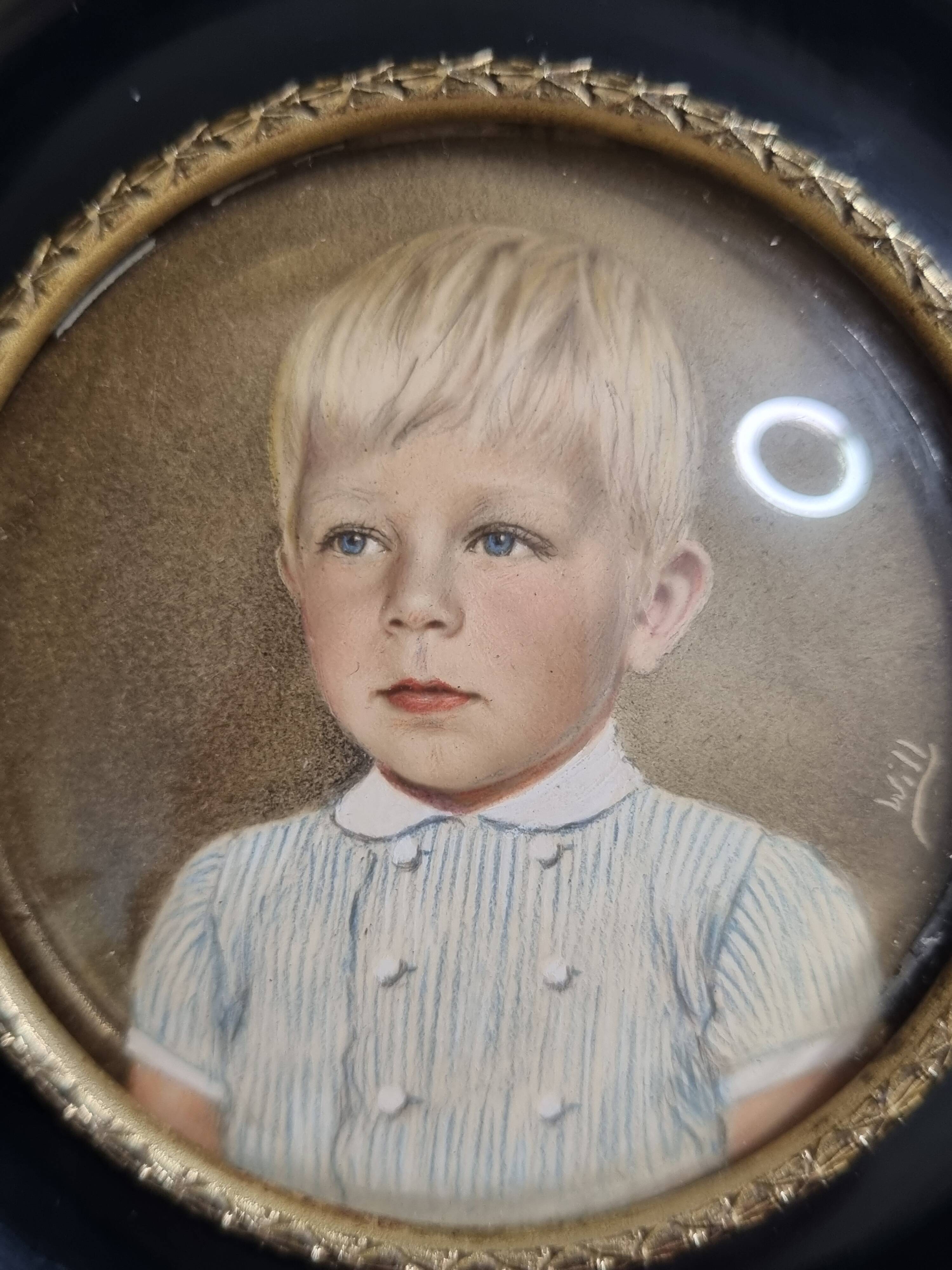 Miniature portrait of a young boy signed, wooden frame with convex glass, 12x12 cm.