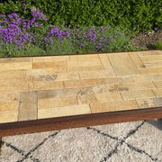Vintage coffee table in rosewood and ceramic.