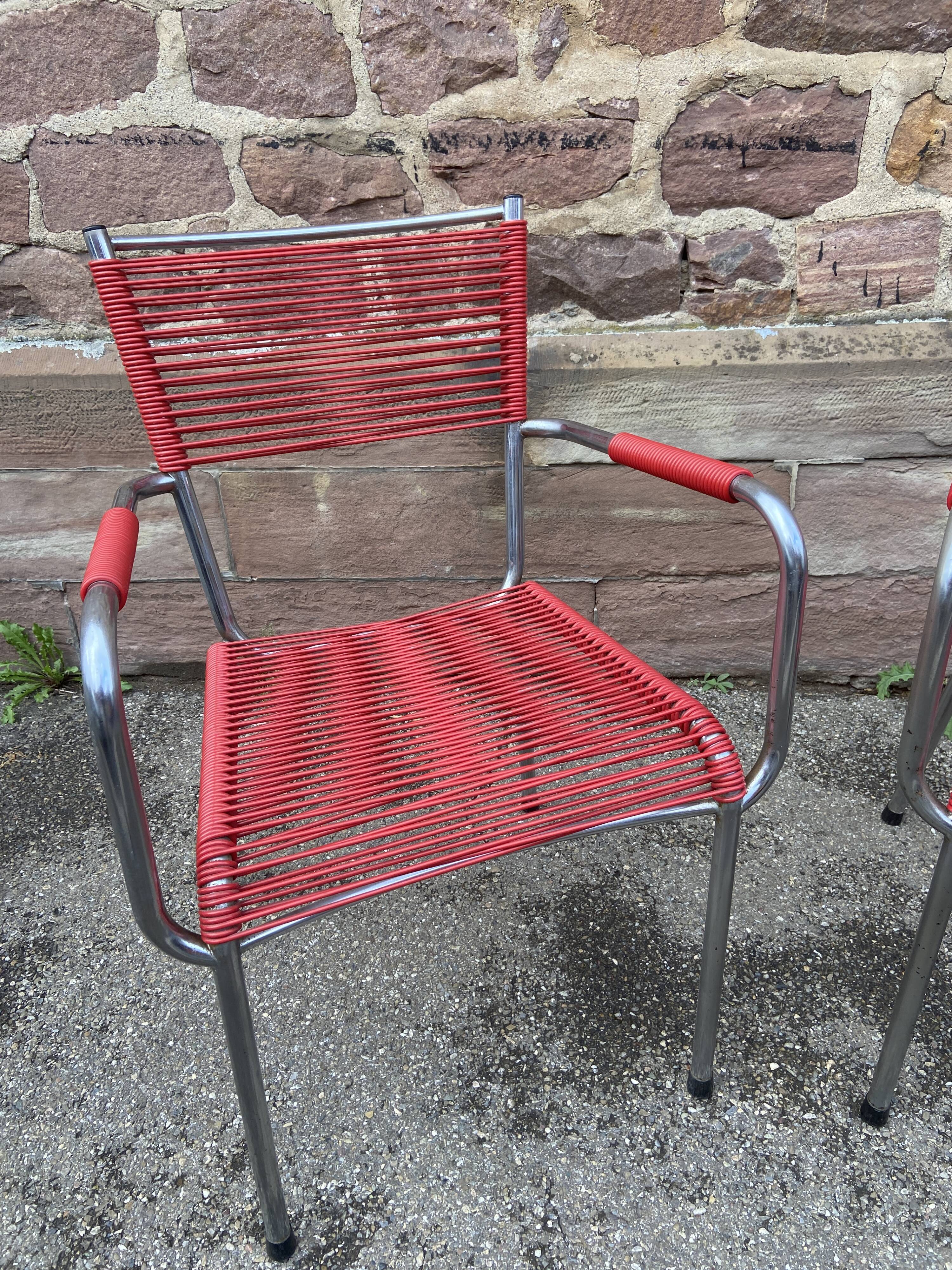 Pair of scoubidou armchairs