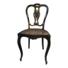 Blackened wooden chair