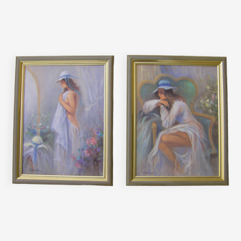 Paire de peintures  à décor féminin