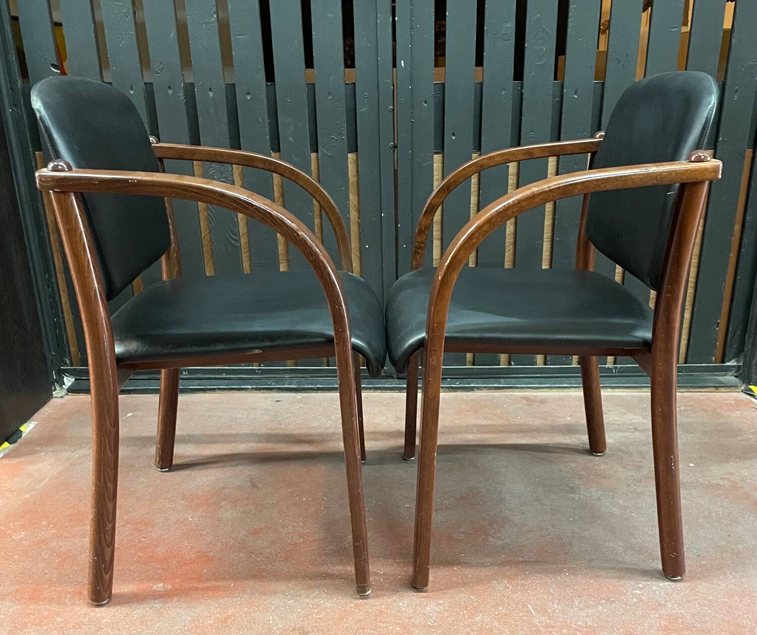 Pair of wooden and leatherette armchairs from the 80s