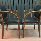 Pair of wooden and leatherette armchairs from the 80s