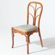 Pair of rattan and blue floral fabric chairs