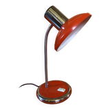 Orange articulated desk lamp