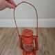 Ancienne lampe à pétrole orange vintage