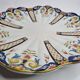 Old dish in polychrome earthenware from Desvres decorated from Rouen, signed, 34 cm