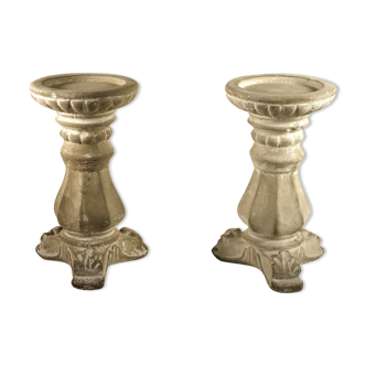 Pair of cement candlesticks