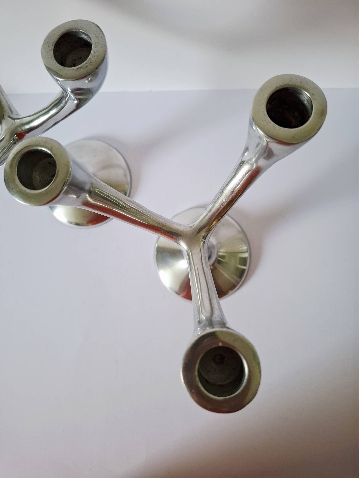 Vintage aluminium candlestick duo