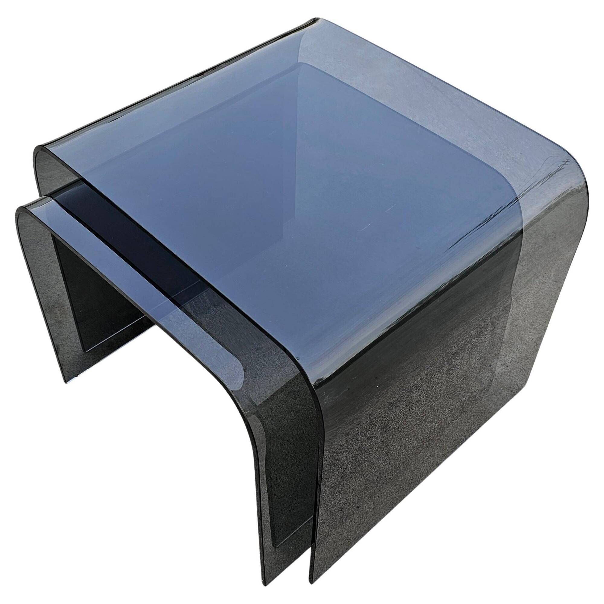 Pair of Waterfall nesting tables in tinted glass attributed to FIAM 1980s.