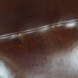 Fauteuil anglais ancien en cuir de mouton