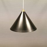 Cone pendant produced by Danish Lyfa in beautiful black lacquer with perforated shade and brass top.