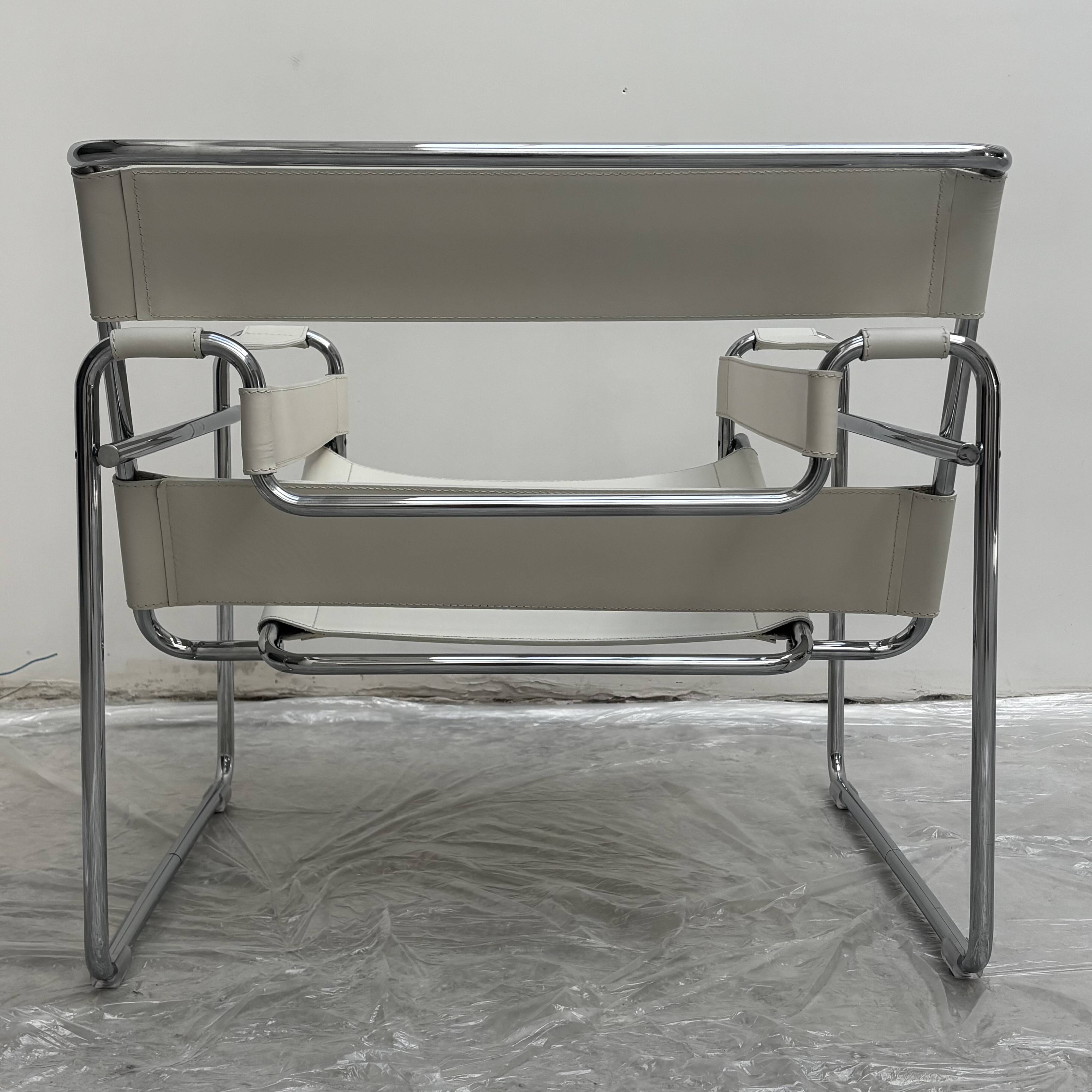 "Wassily" armchair by Marcel Breuer for Gavina in white leather.
