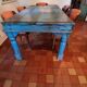 Large antique Indian dining table made of teak wood with patina.