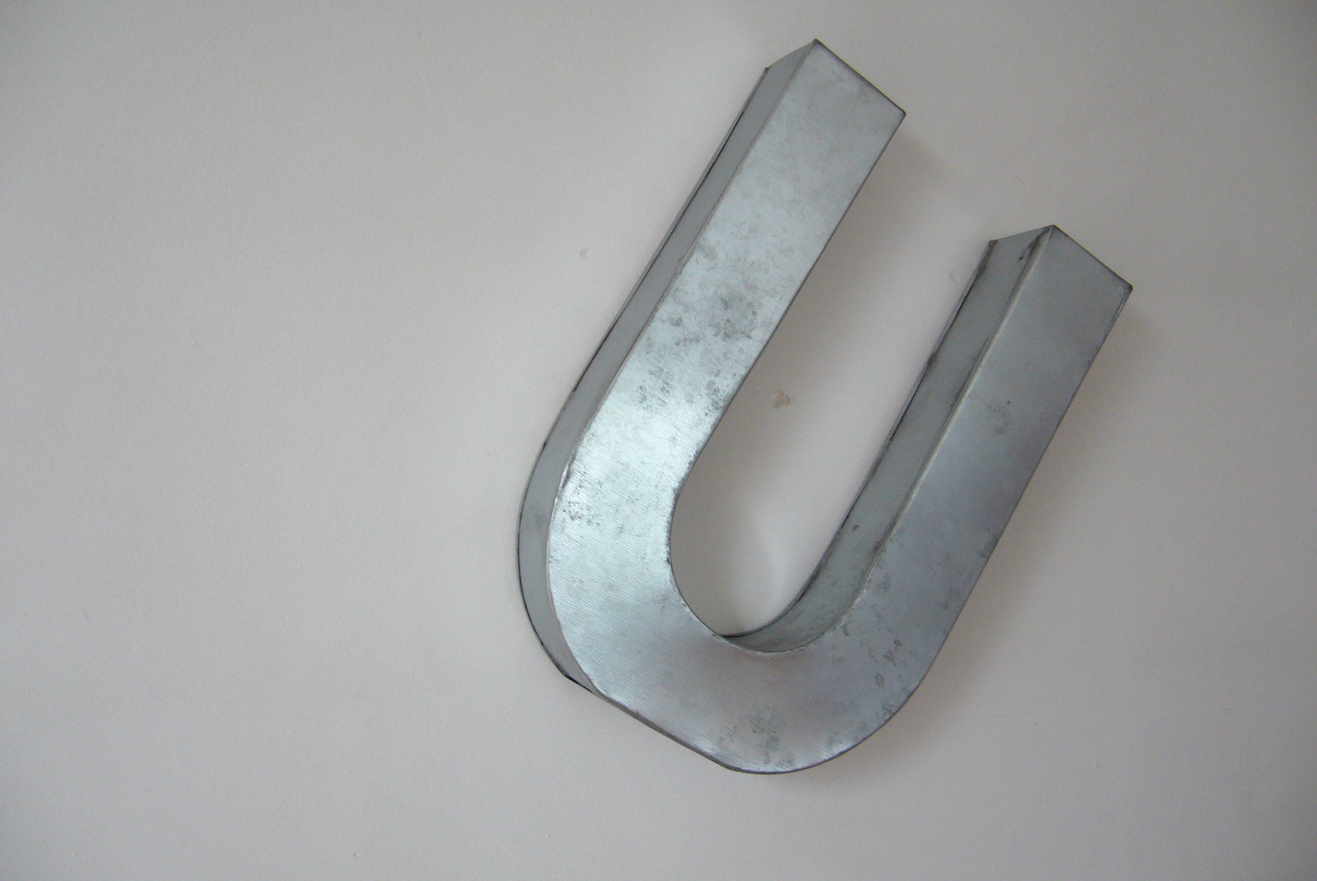Letter U industrial white metal