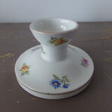 Old candle holder in flowered porcelain