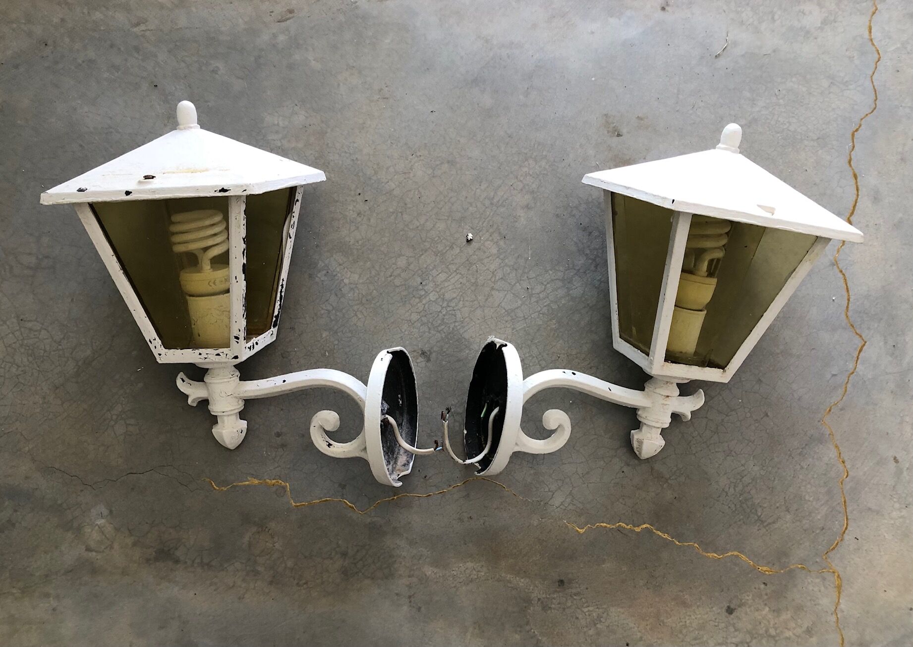 Pair of old wall lamps for outdoor use