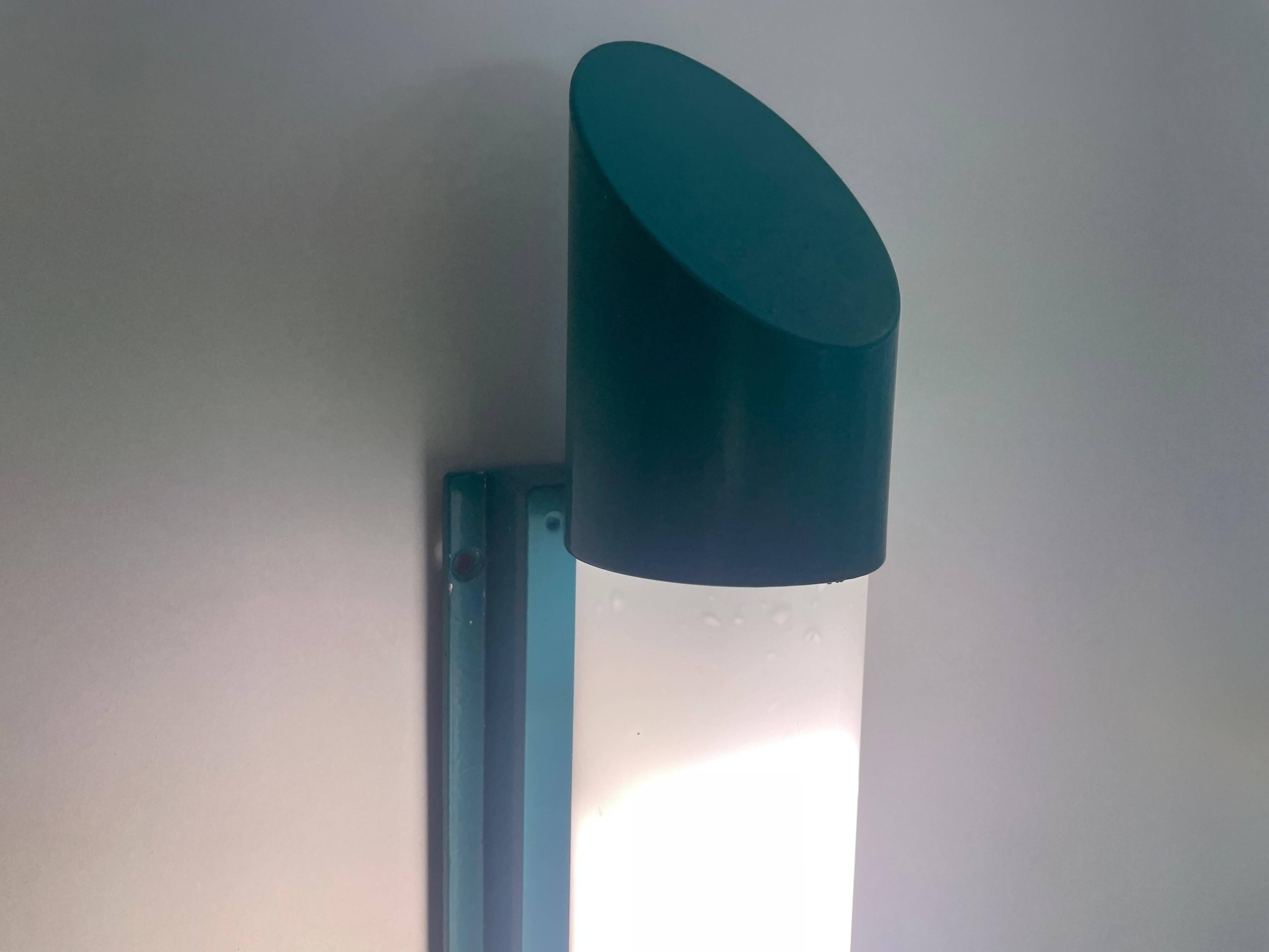 Simple cylindrical wall light in opal glass and turquoise metal, 1970s, Germany