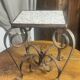 Occasional table in wrought iron and marble