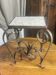 Occasional table in wrought iron and marble