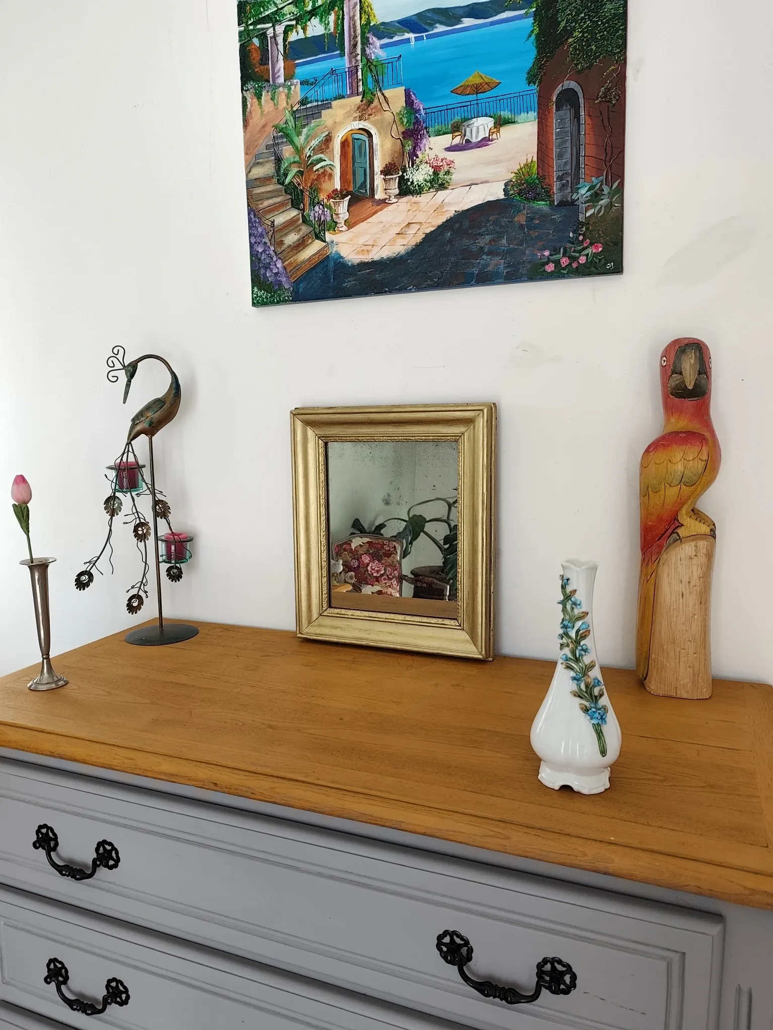 Small Art Deco mirror with a gilded wooden frame.