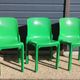 Set of 4 green Selene Magistretti chairs.