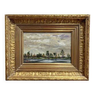 Oil on copper depicting a landscape by the river in the twentieth century