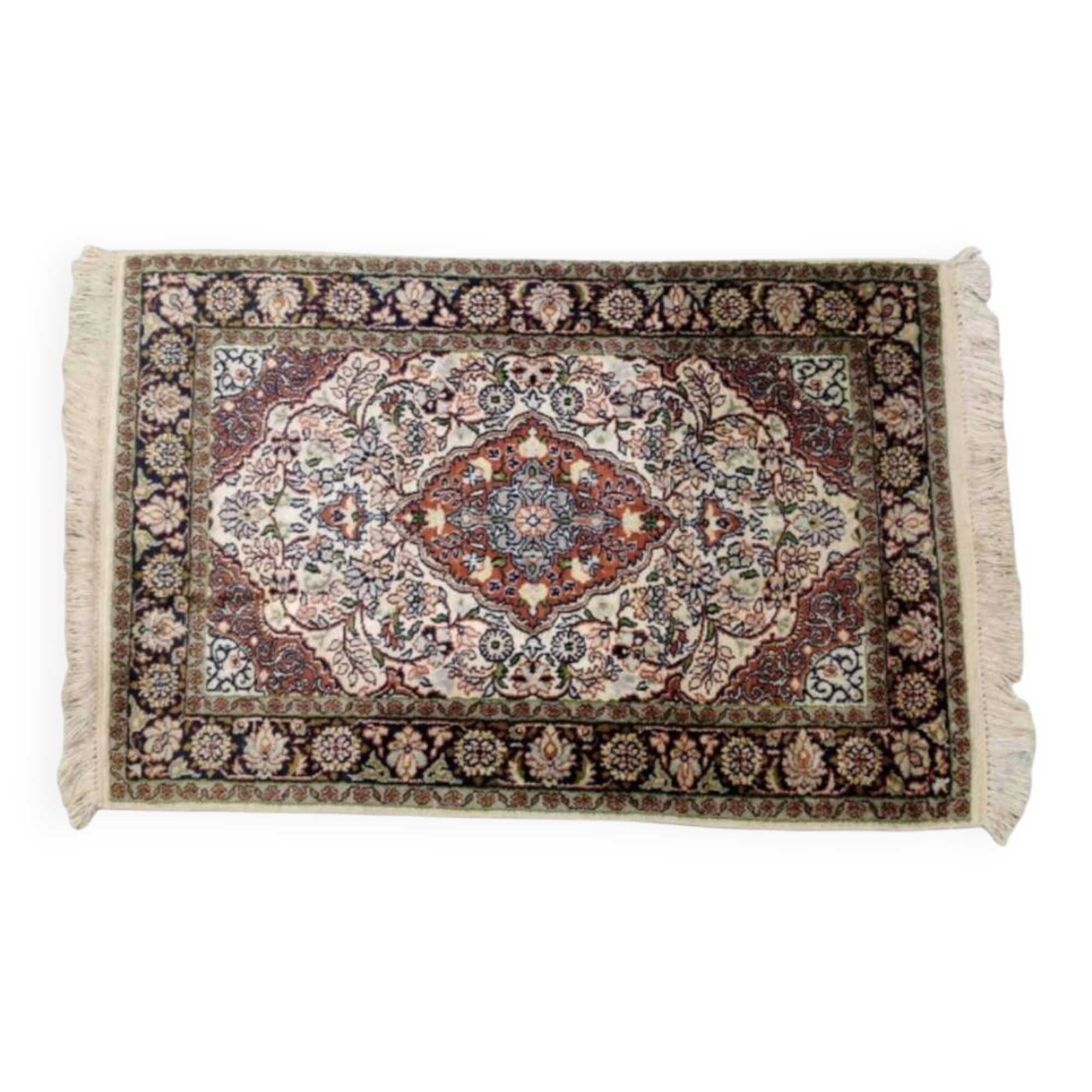 Handmade Persian carpet in wool and silk.