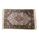 Handmade Persian carpet in wool and silk.