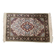 Handmade Persian carpet in wool and silk.