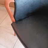 Pair of leather and wood armchairs in the Umberto Asnago style.